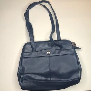 A beautiful blue Etienne Aigner pursue